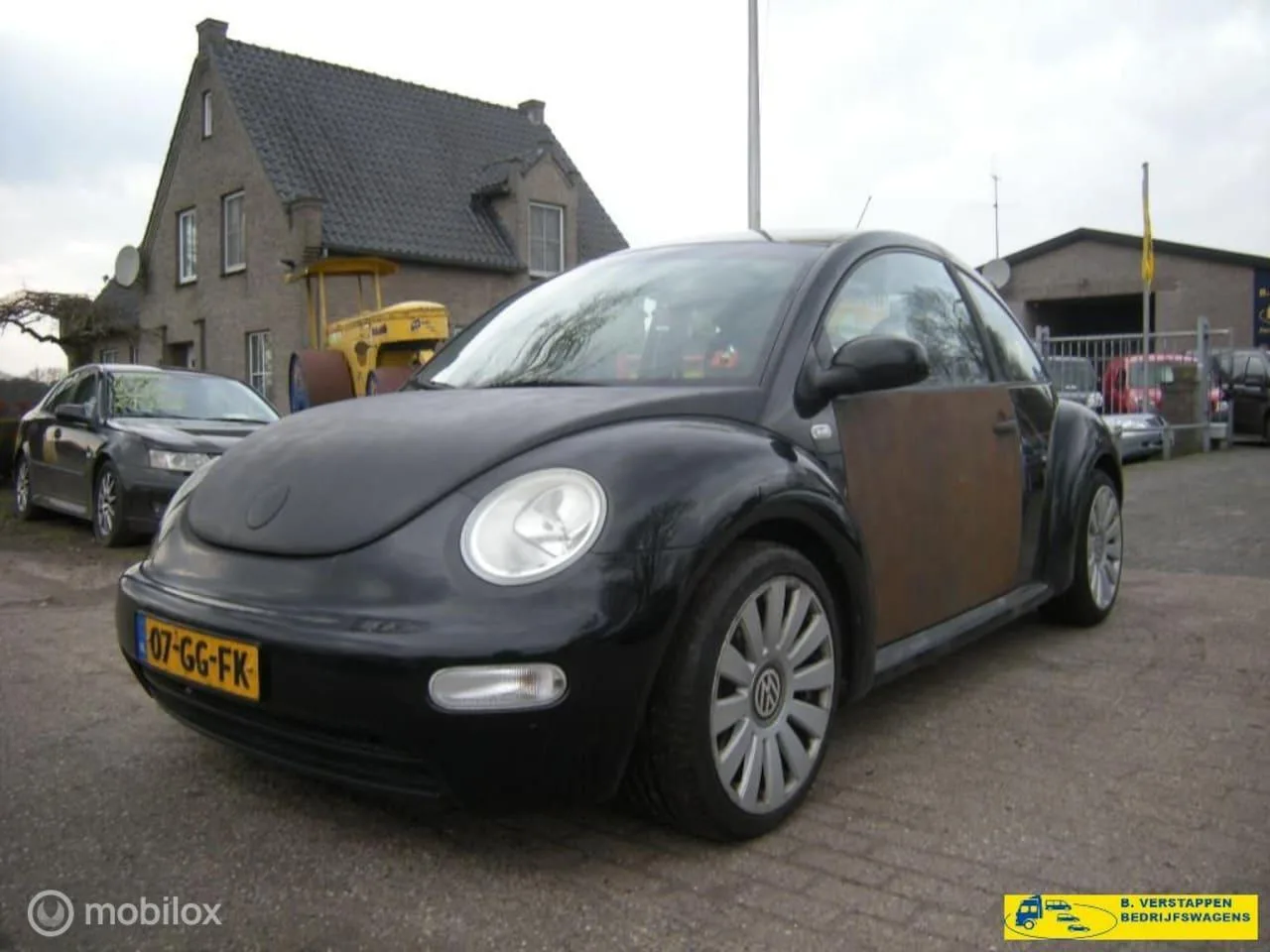Volkswagen New Beetle (2000) — foto 1
