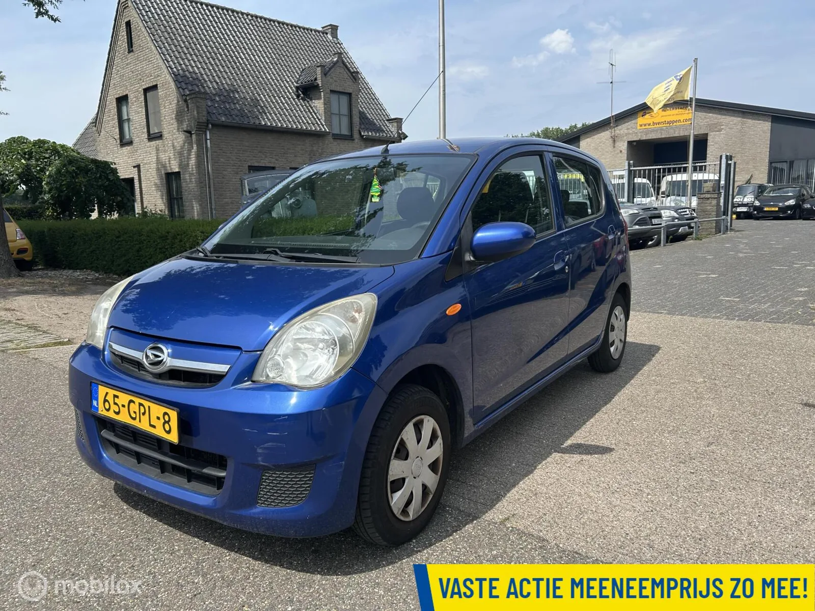 Daihatsu Cuore (2008) — foto 1
