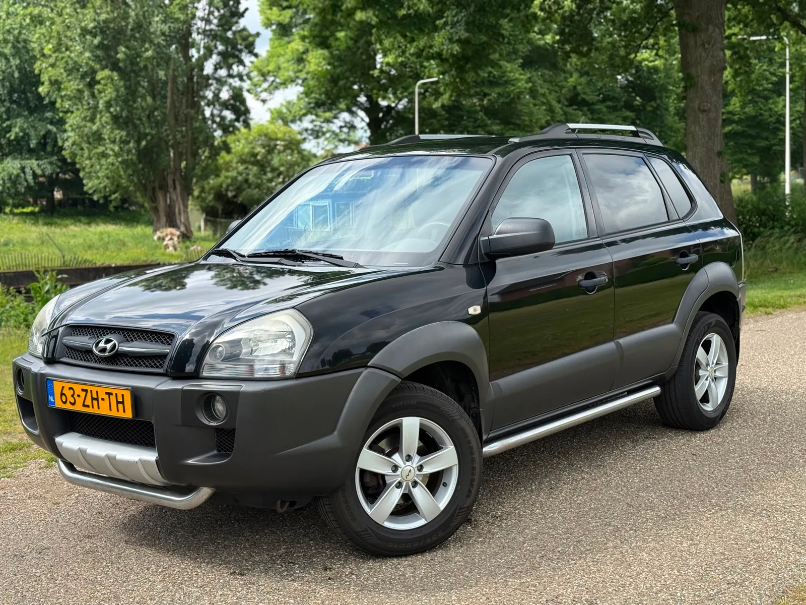 Hyundai Tucson (2008) — foto 1