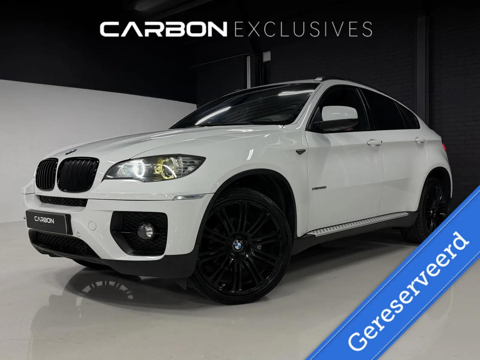 BMW X6 (2011) — foto 1