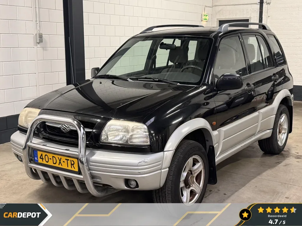 Suzuki Grand Vitara (2000) — foto 1