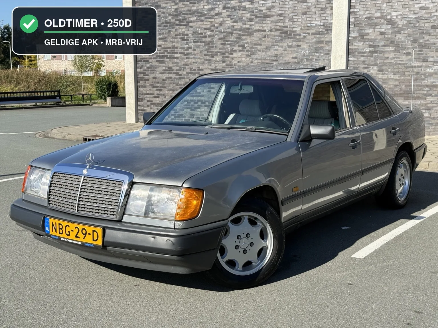 Mercedes-Benz 200-Serie (1987) — foto 1