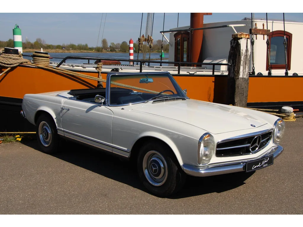 Mercedes-Benz 200-Serie (1964) — foto 1