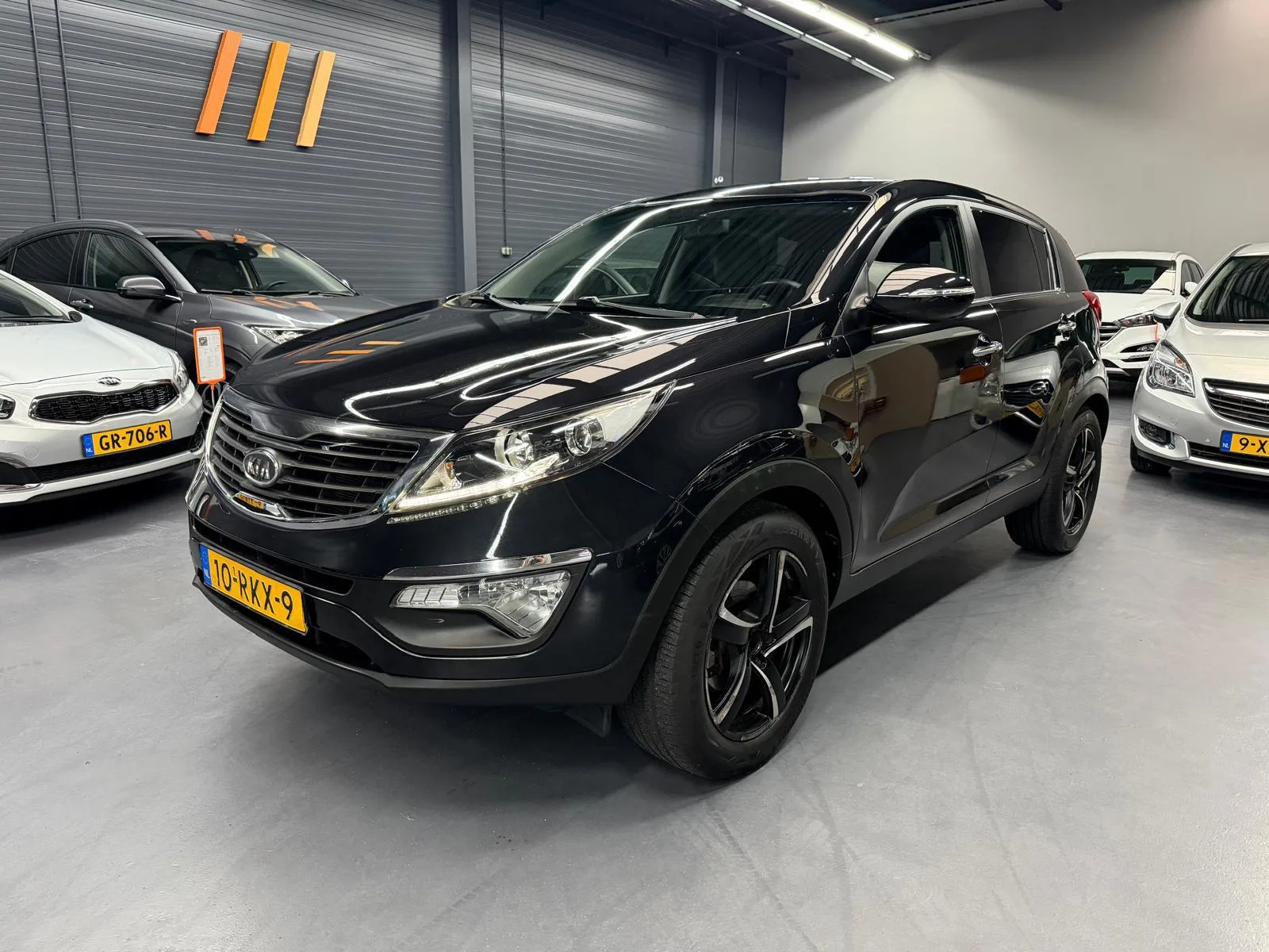 Kia Sportage (2011) — foto 1