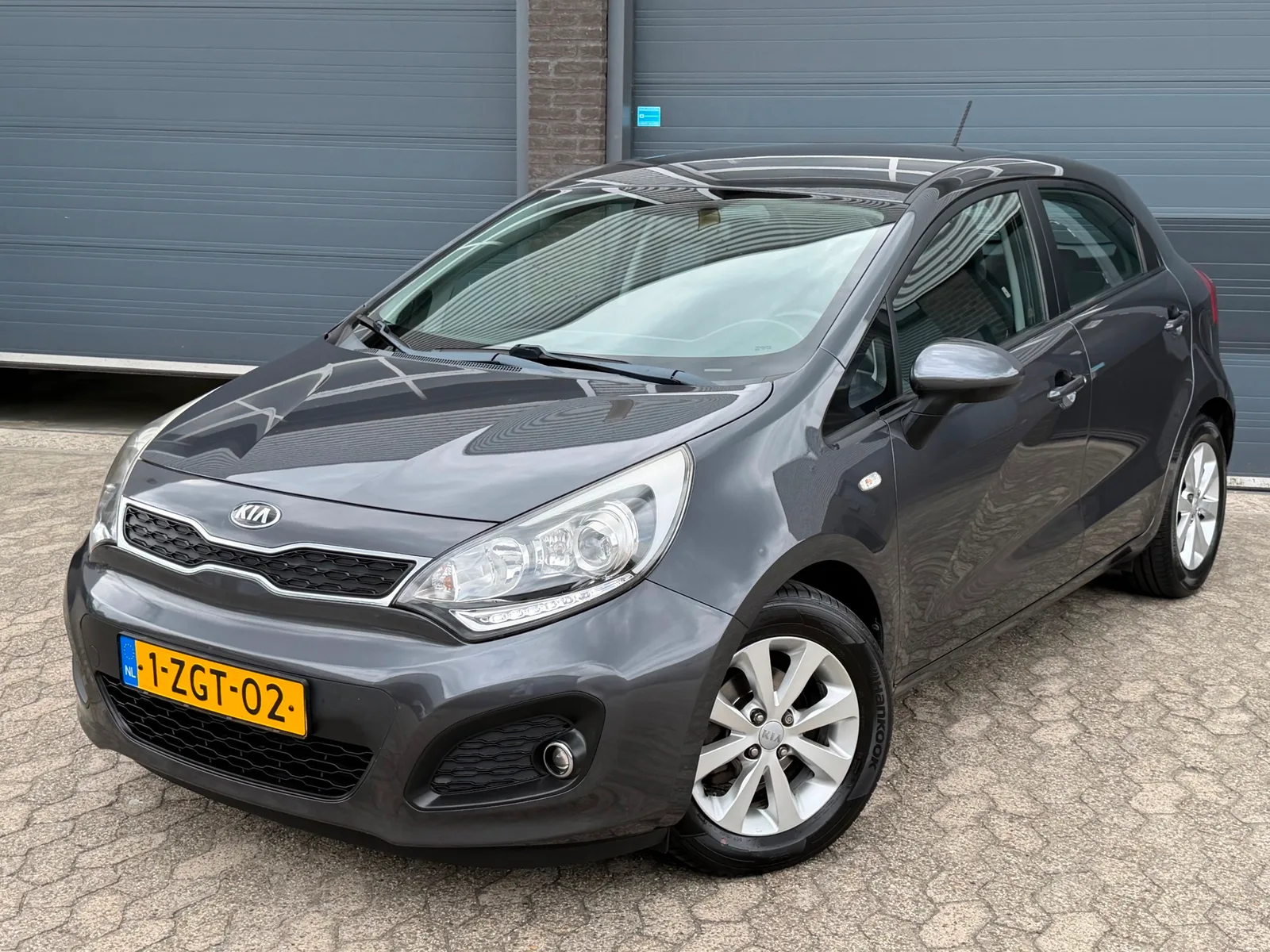 Kia Rio (2015) — foto 1