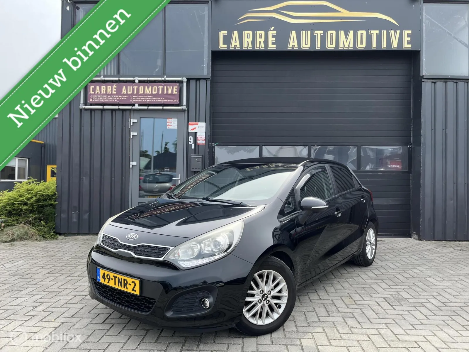 Kia Rio (2012) — foto 1