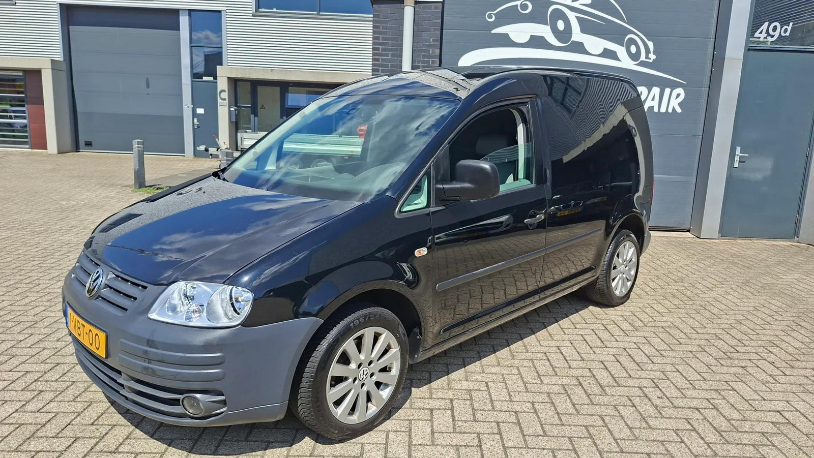 Volkswagen Caddy (2009) — foto 1