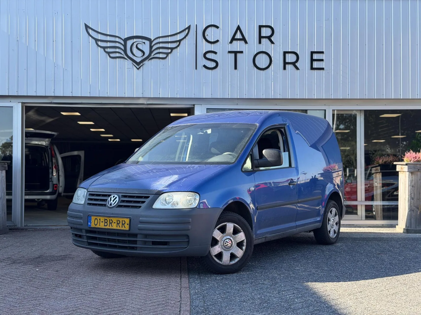 Volkswagen Caddy (2004) — foto 1