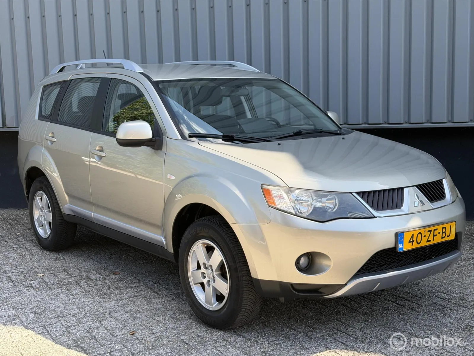 Mitsubishi Outlander (2008) — foto 1