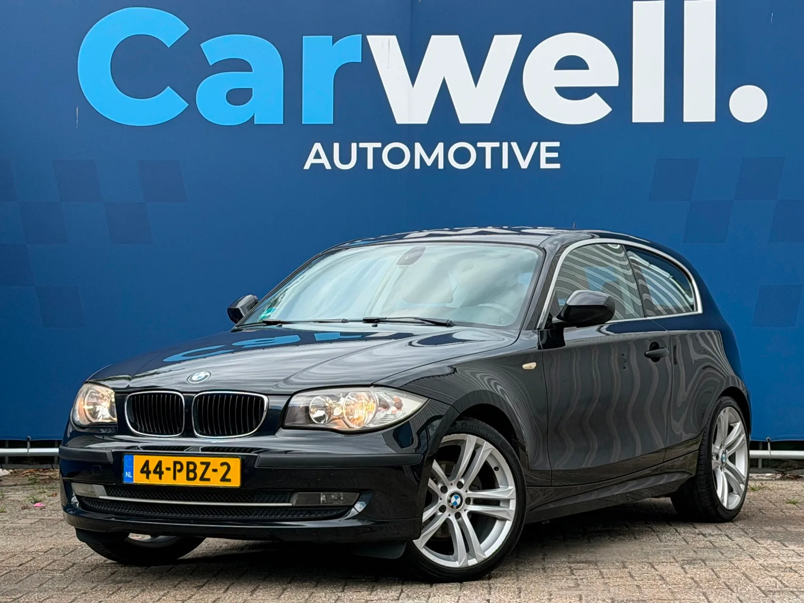 BMW 1-Serie (2010) — foto 1