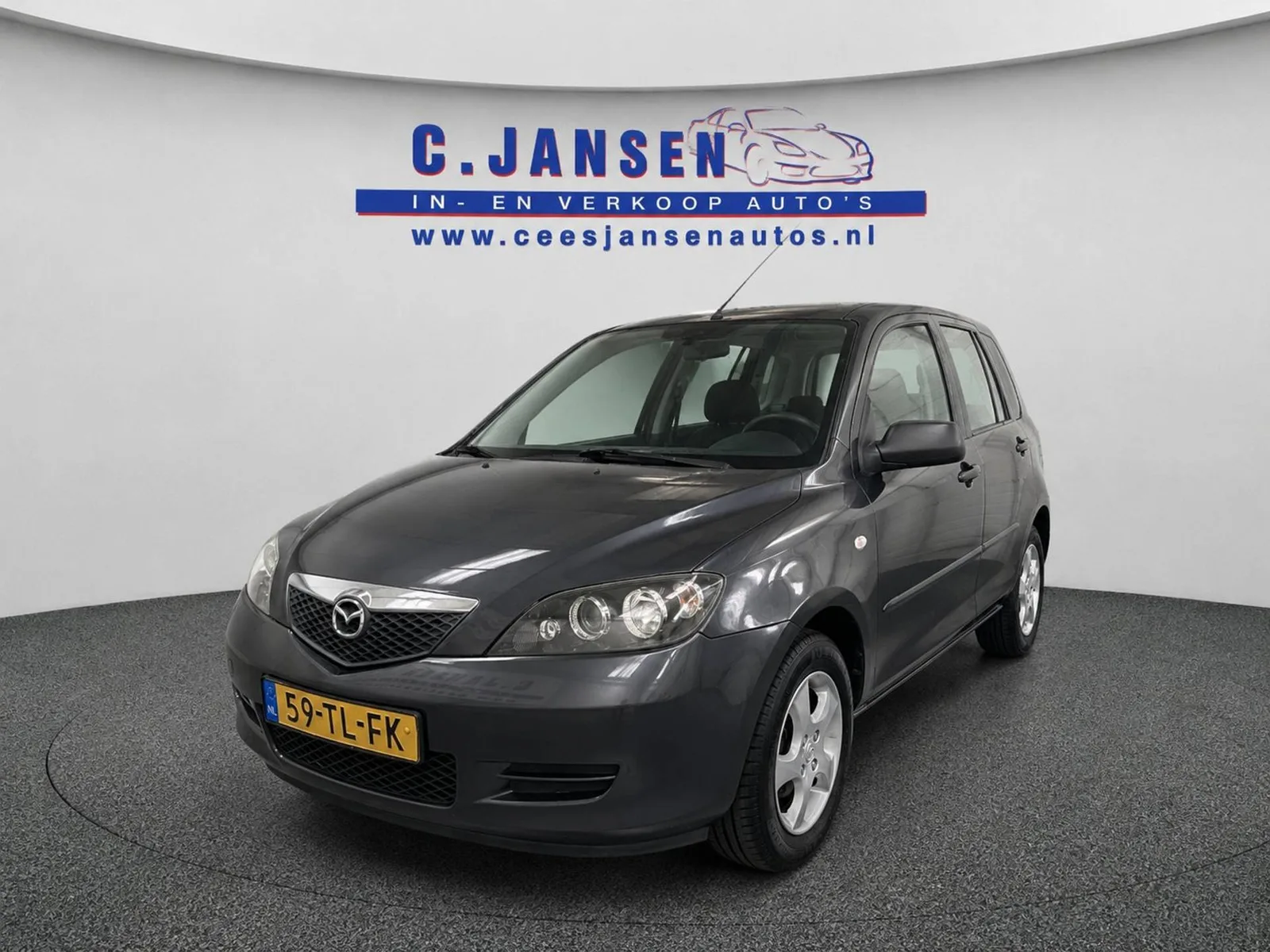 Mazda 2 (2006) — foto 1