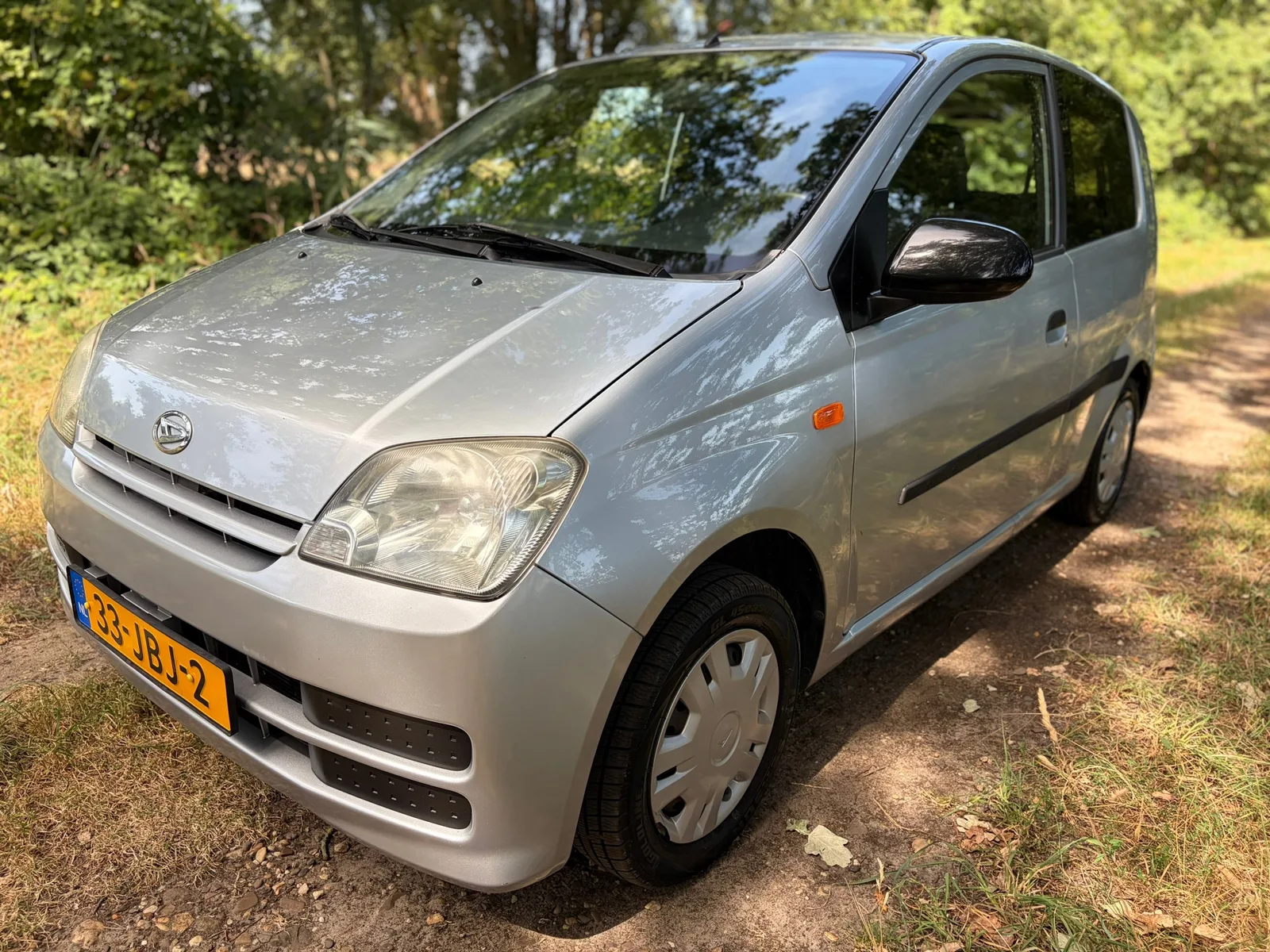 Daihatsu Cuore (2009) — foto 1