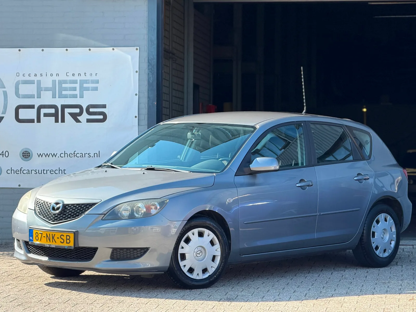 Mazda 3 (2003) — foto 1