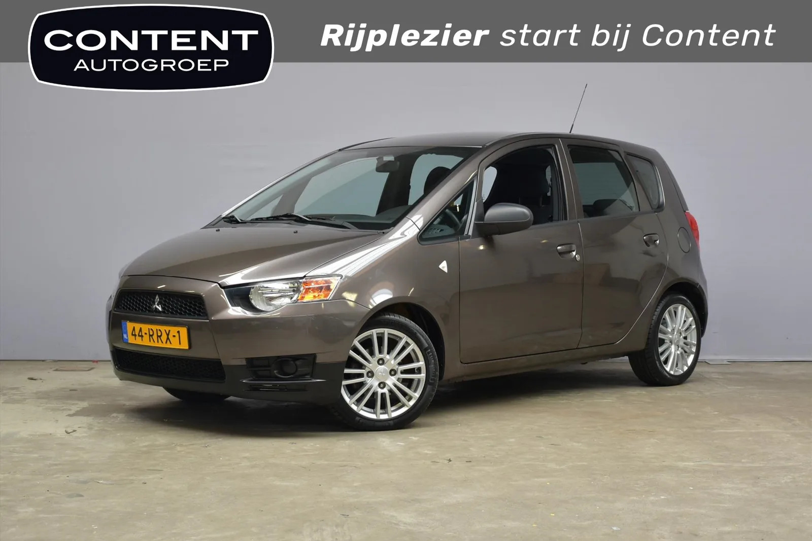 Mitsubishi Colt (2011) — foto 1