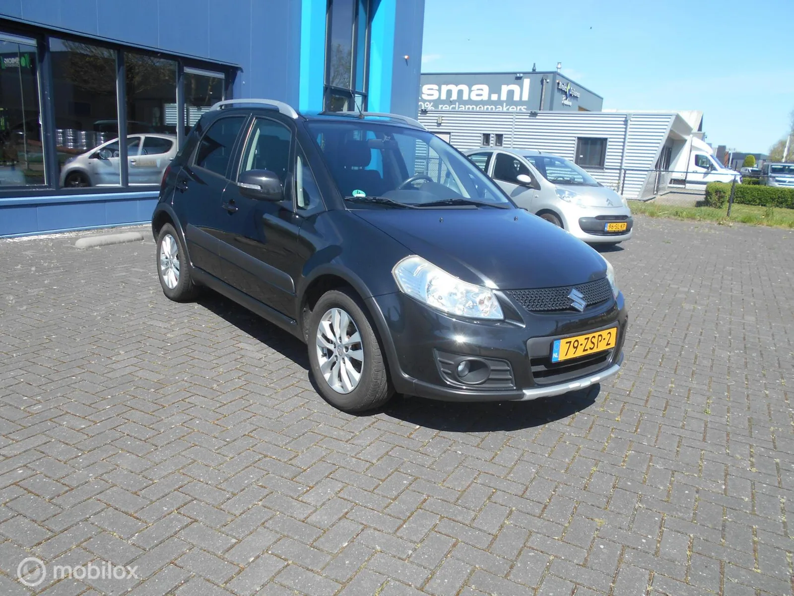 Suzuki SX4 (2013) — foto 1