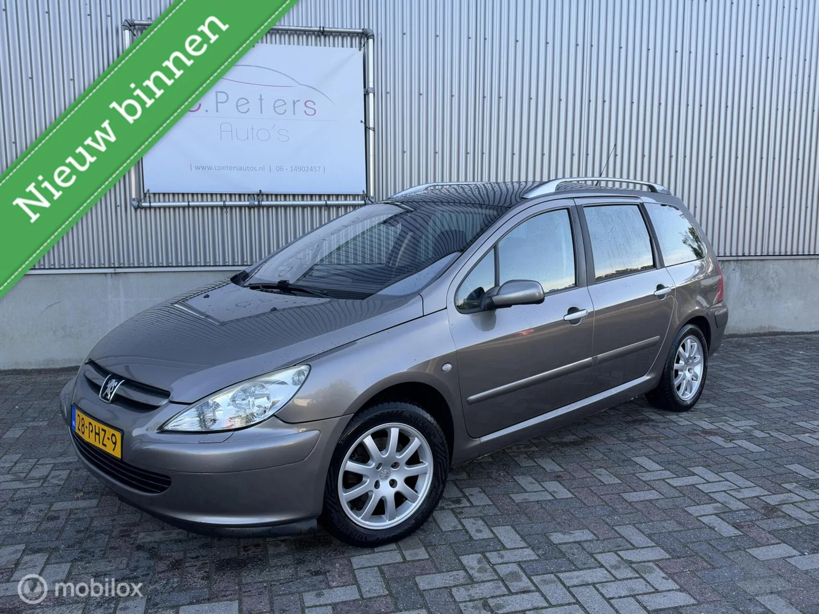 Peugeot 307 (2004) — foto 1