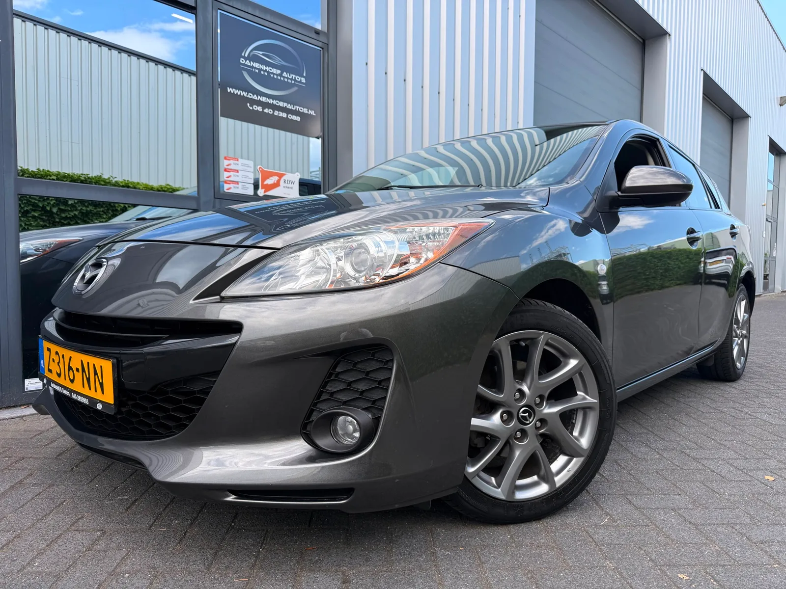 Mazda 3 (2013) — foto 1