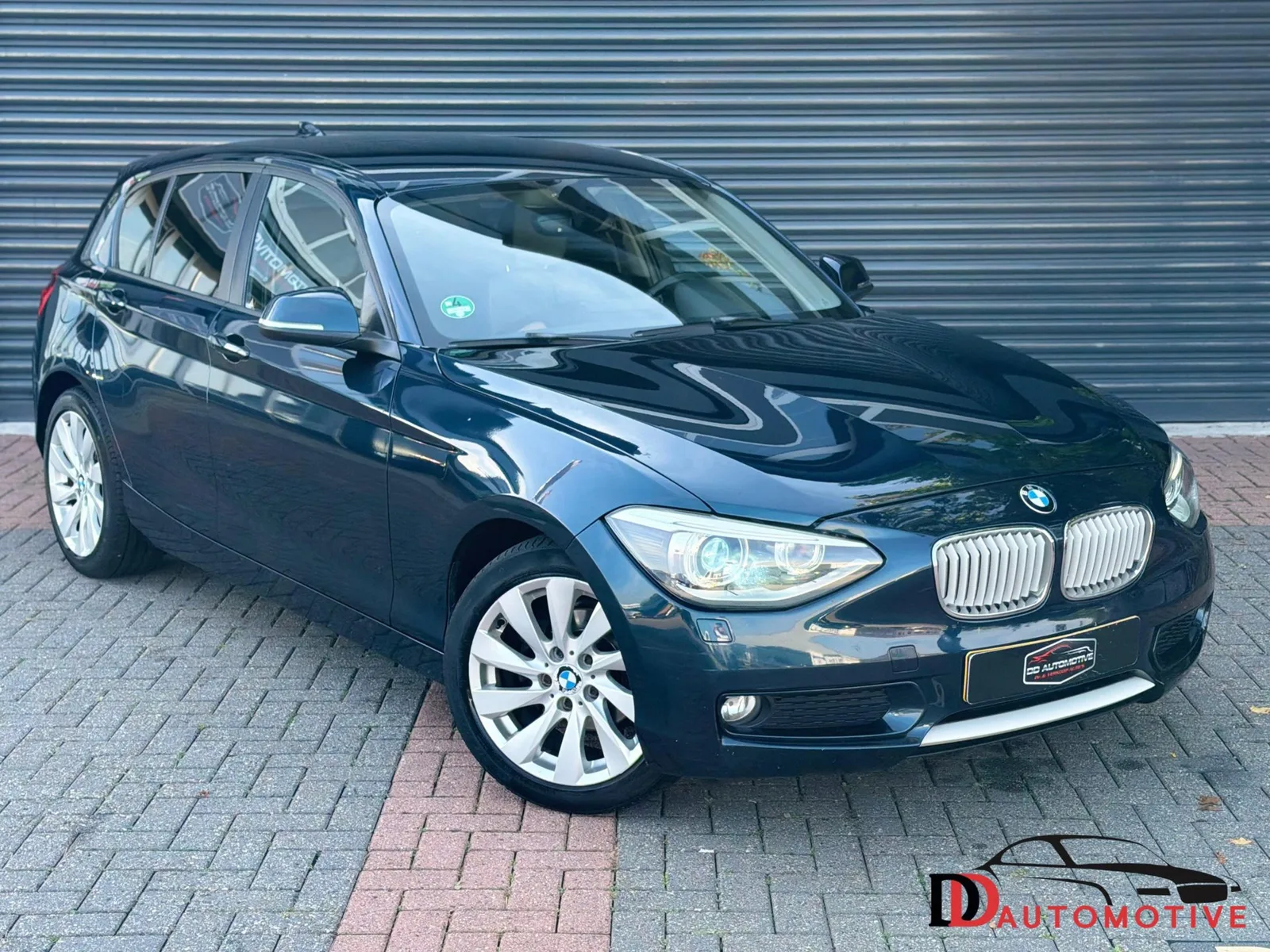 BMW 1-Serie (2011) — foto 1