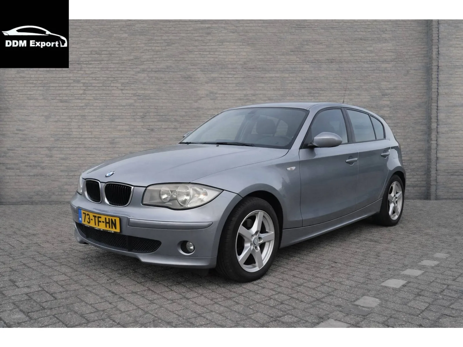 BMW 1-Serie (2006) — foto 1