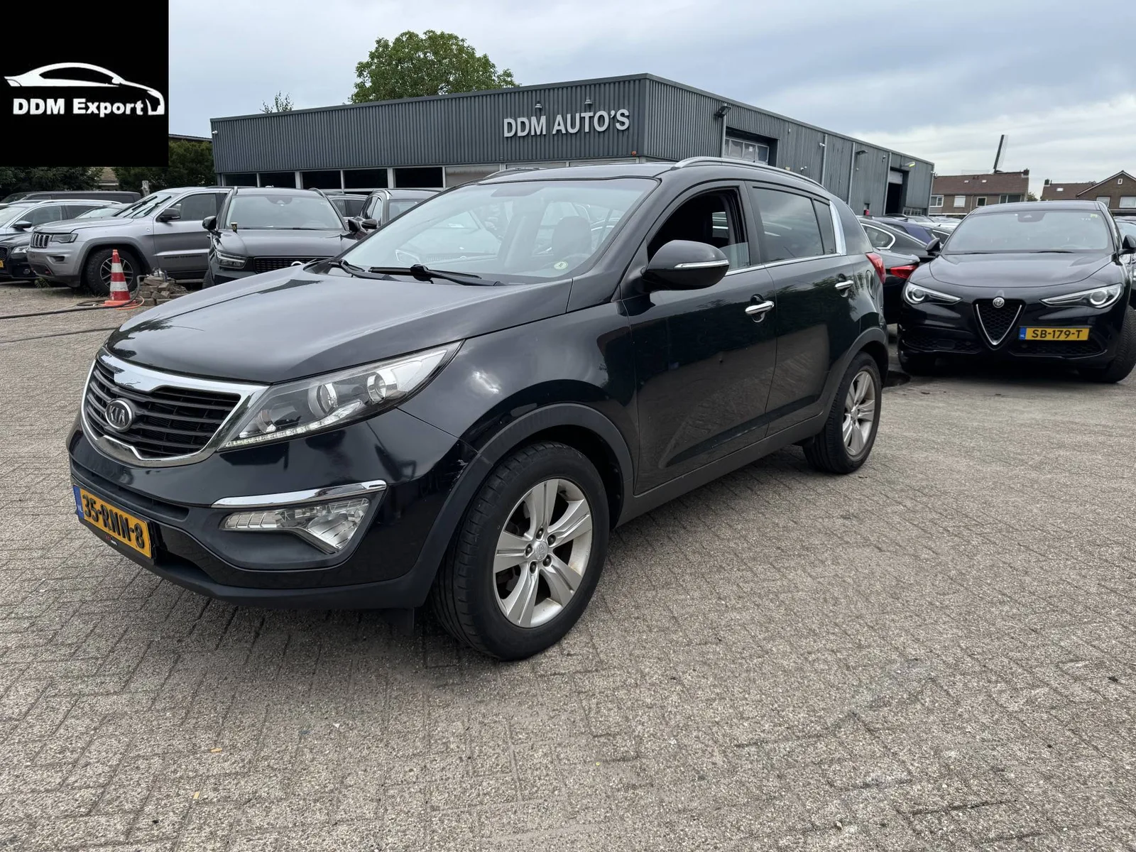 Kia Sportage (2011) — foto 1
