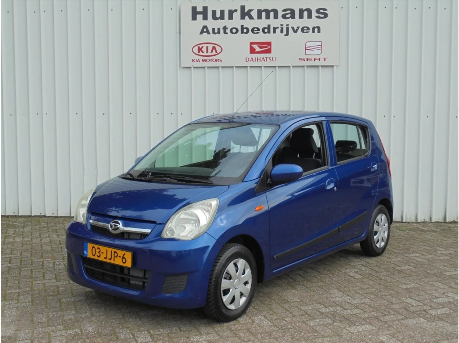 Daihatsu Cuore (2009) — foto 1