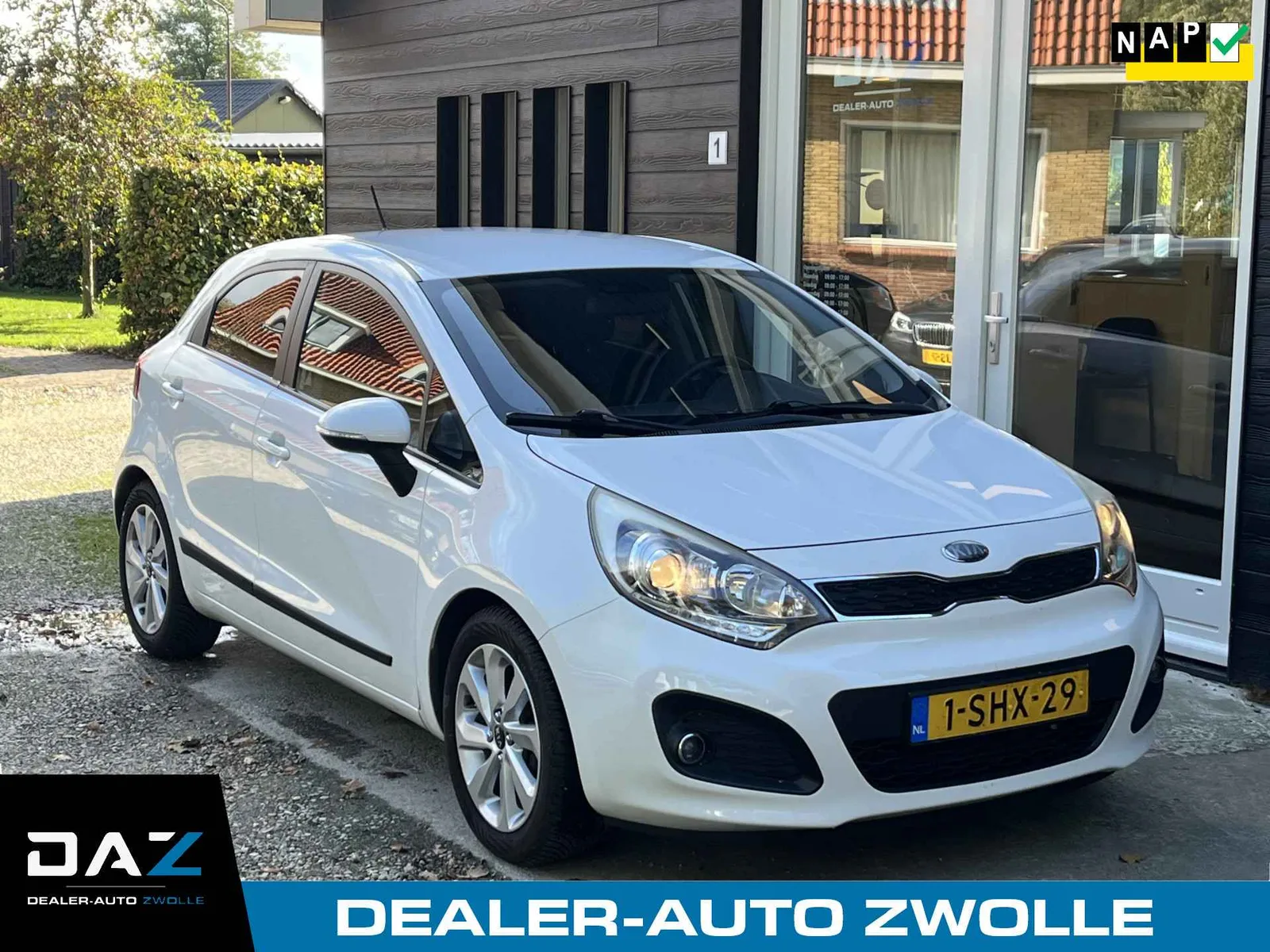 Kia Rio (2013) — foto 1