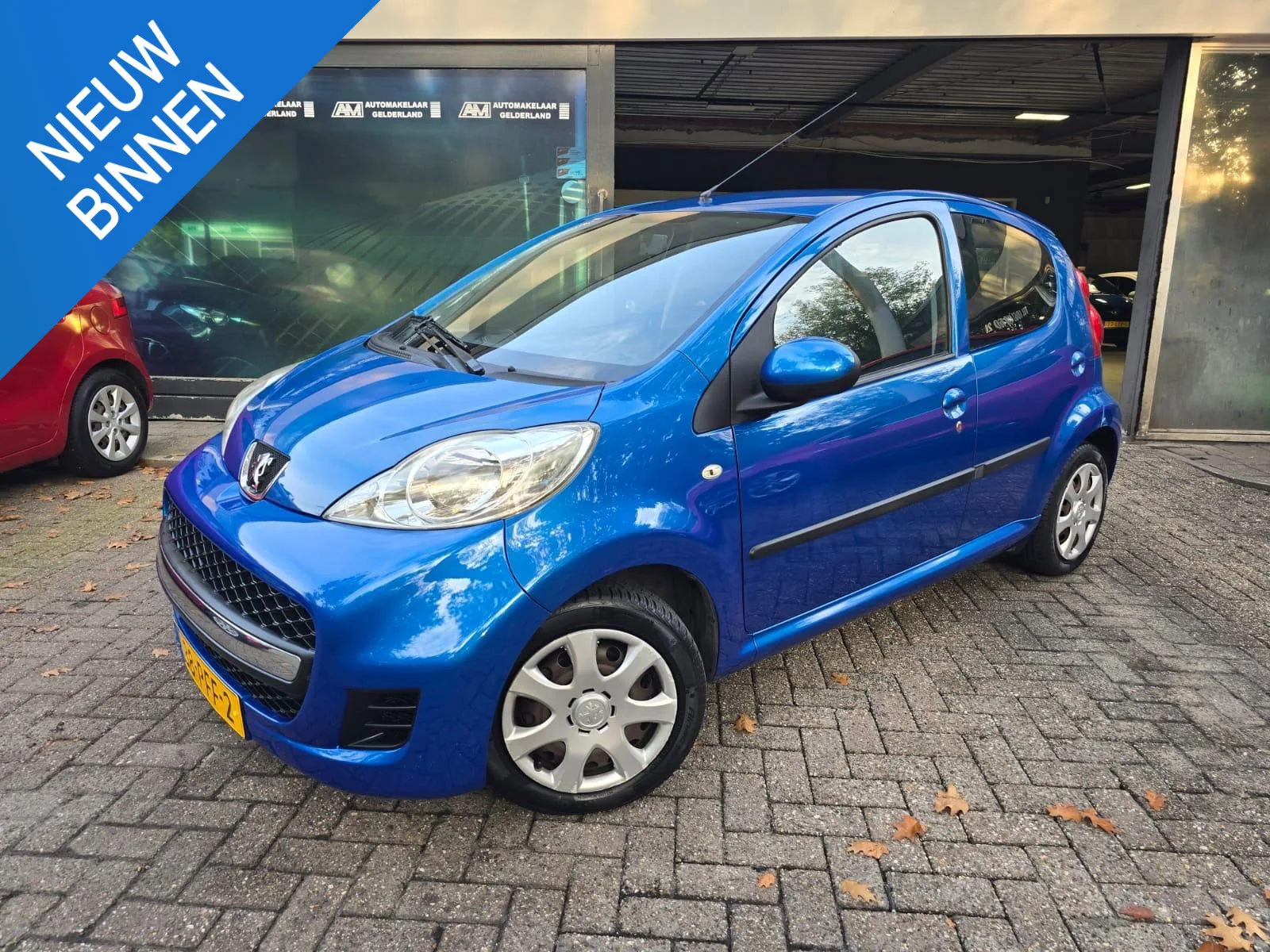 Peugeot 107 (2011) — foto 1