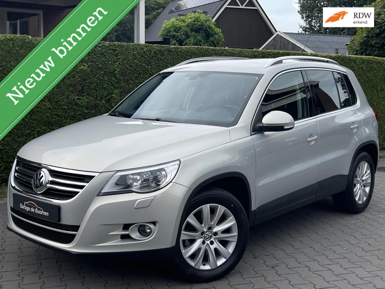 Volkswagen Tiguan (2010) — foto 1