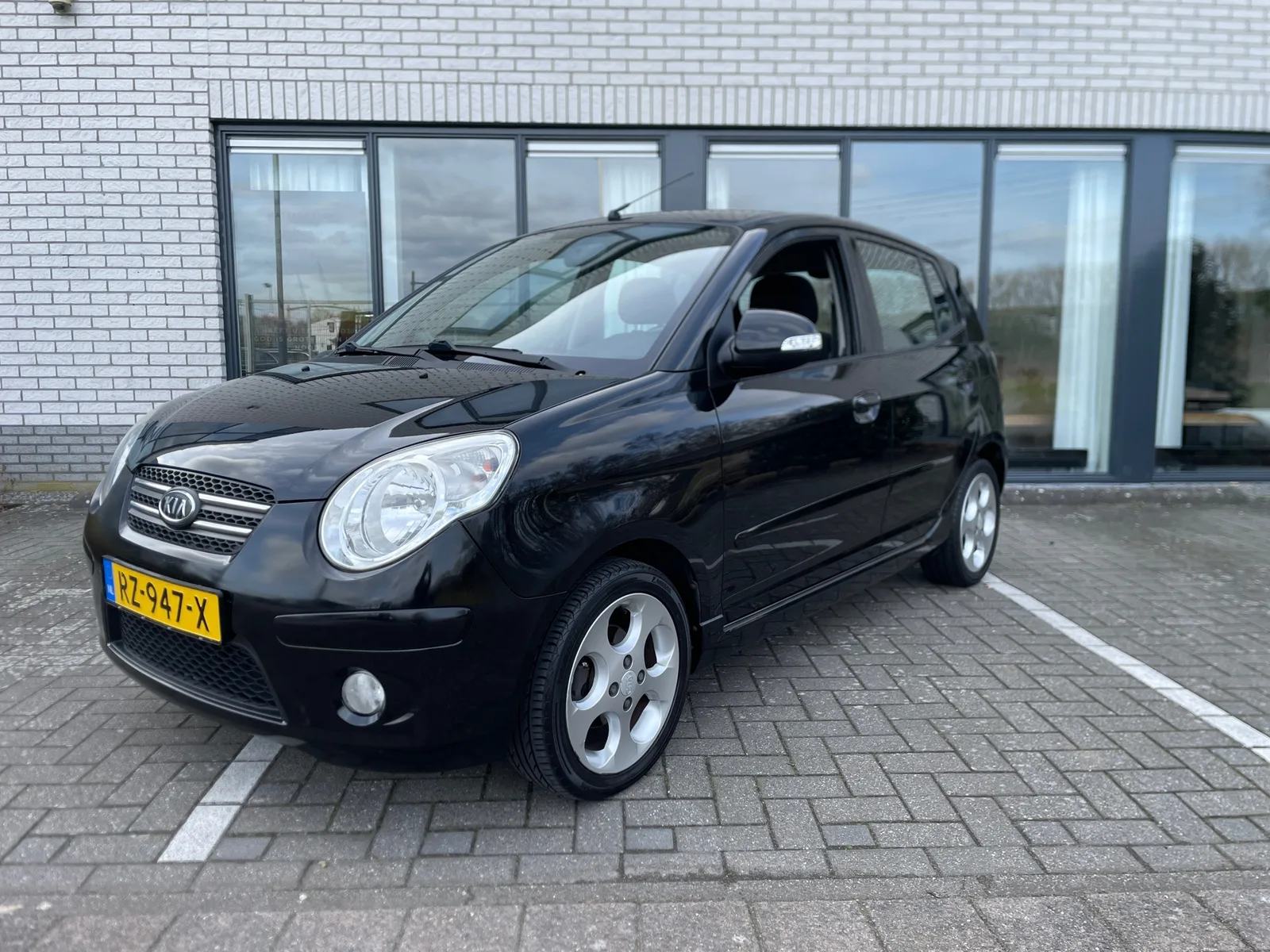 Kia Picanto (2009) — foto 1