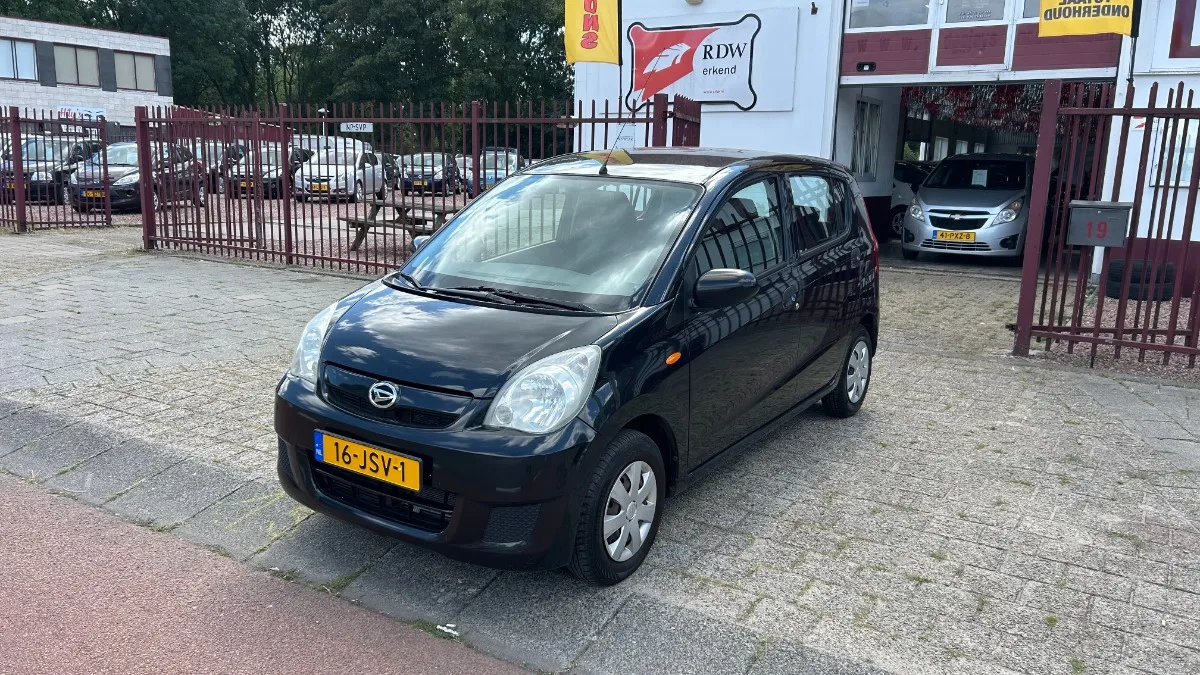Daihatsu Cuore (2009) — foto 1