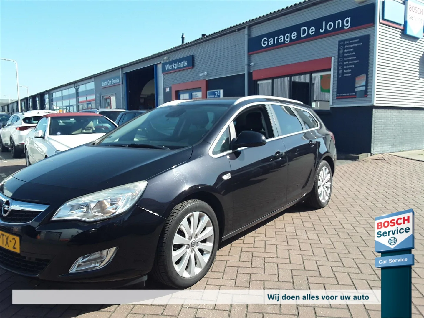 Opel Astra (2011) — foto 1