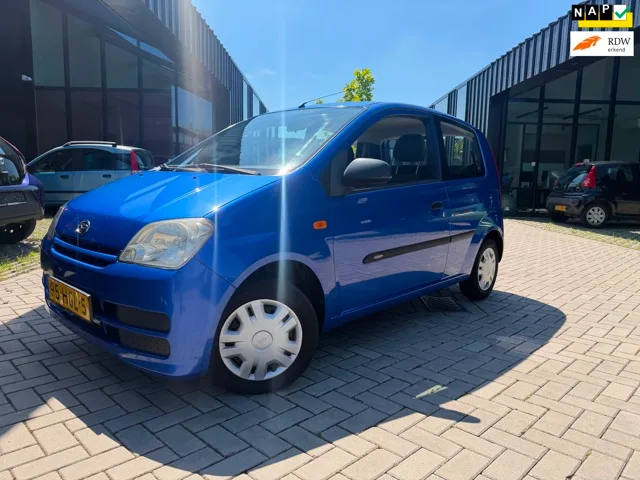 Daihatsu Cuore (2008) — foto 1