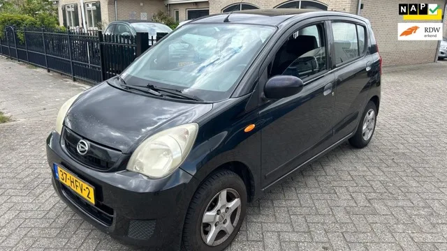 Daihatsu Cuore (2008) — foto 1