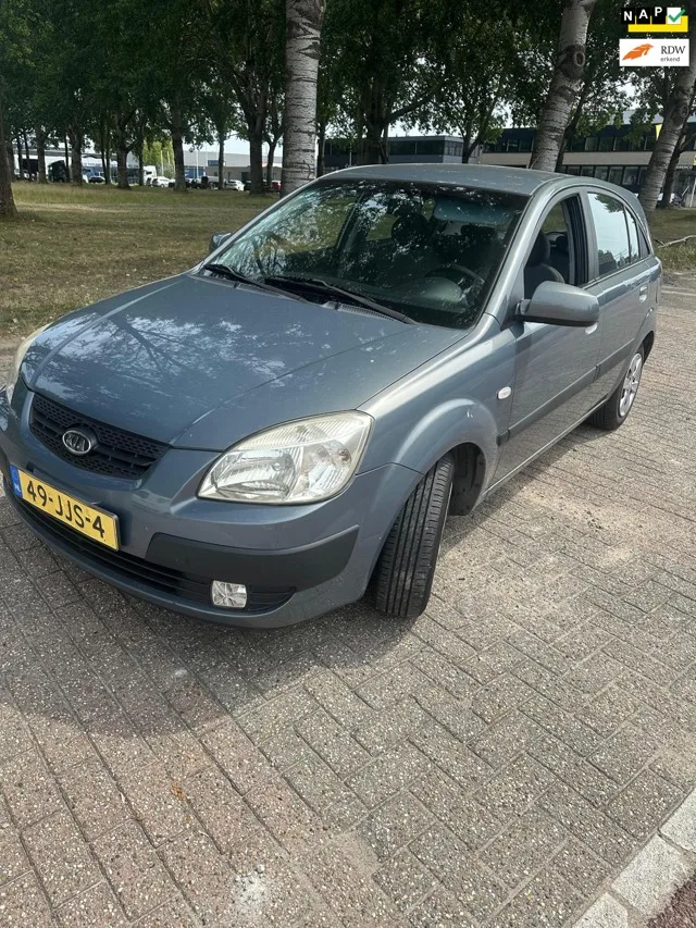 Kia Rio (2009) — foto 1