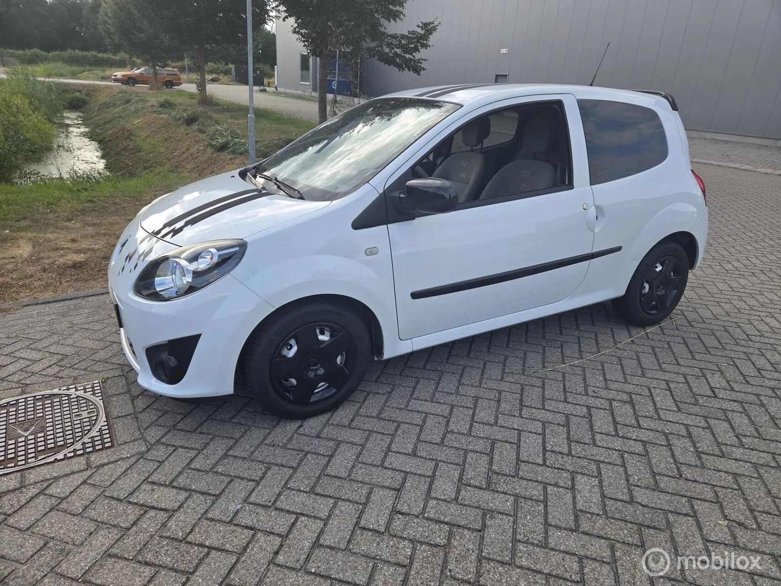 Renault Twingo (2011) — foto 1