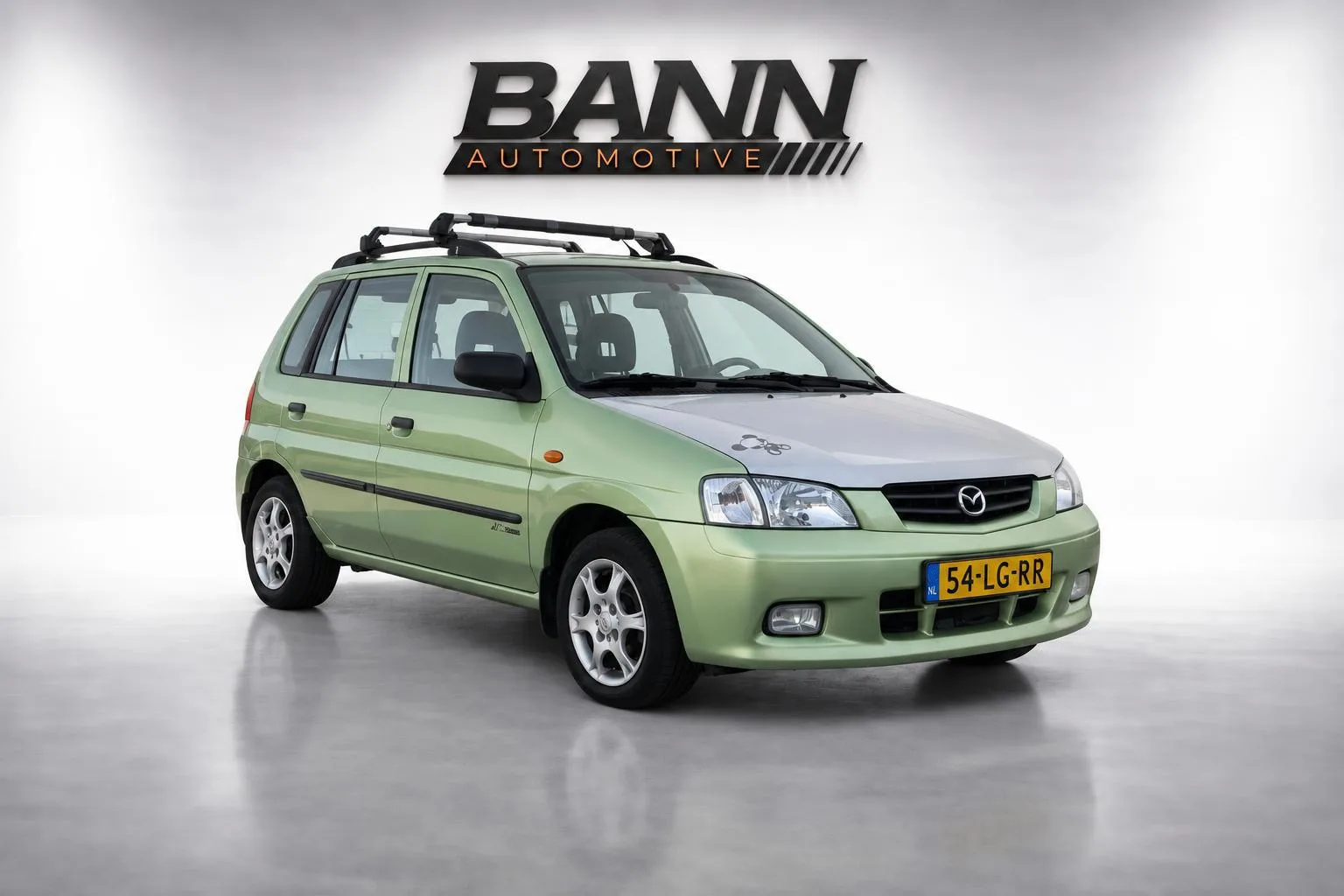 Mazda Demio (2003) — foto 1