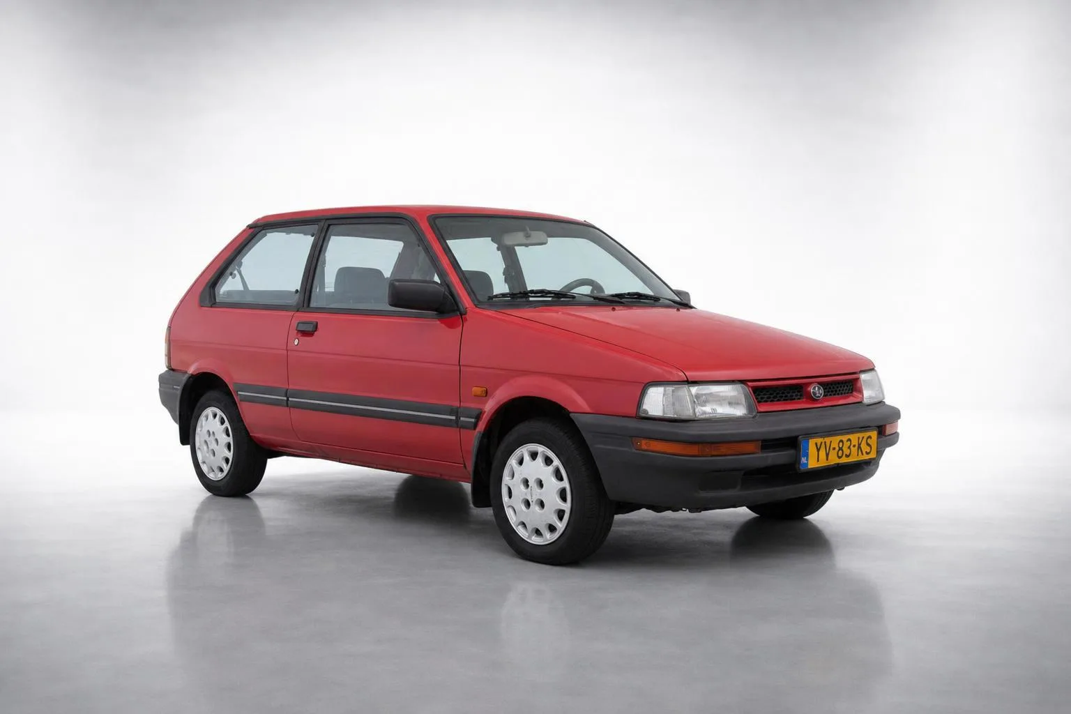 Subaru Justy (1990) — foto 1