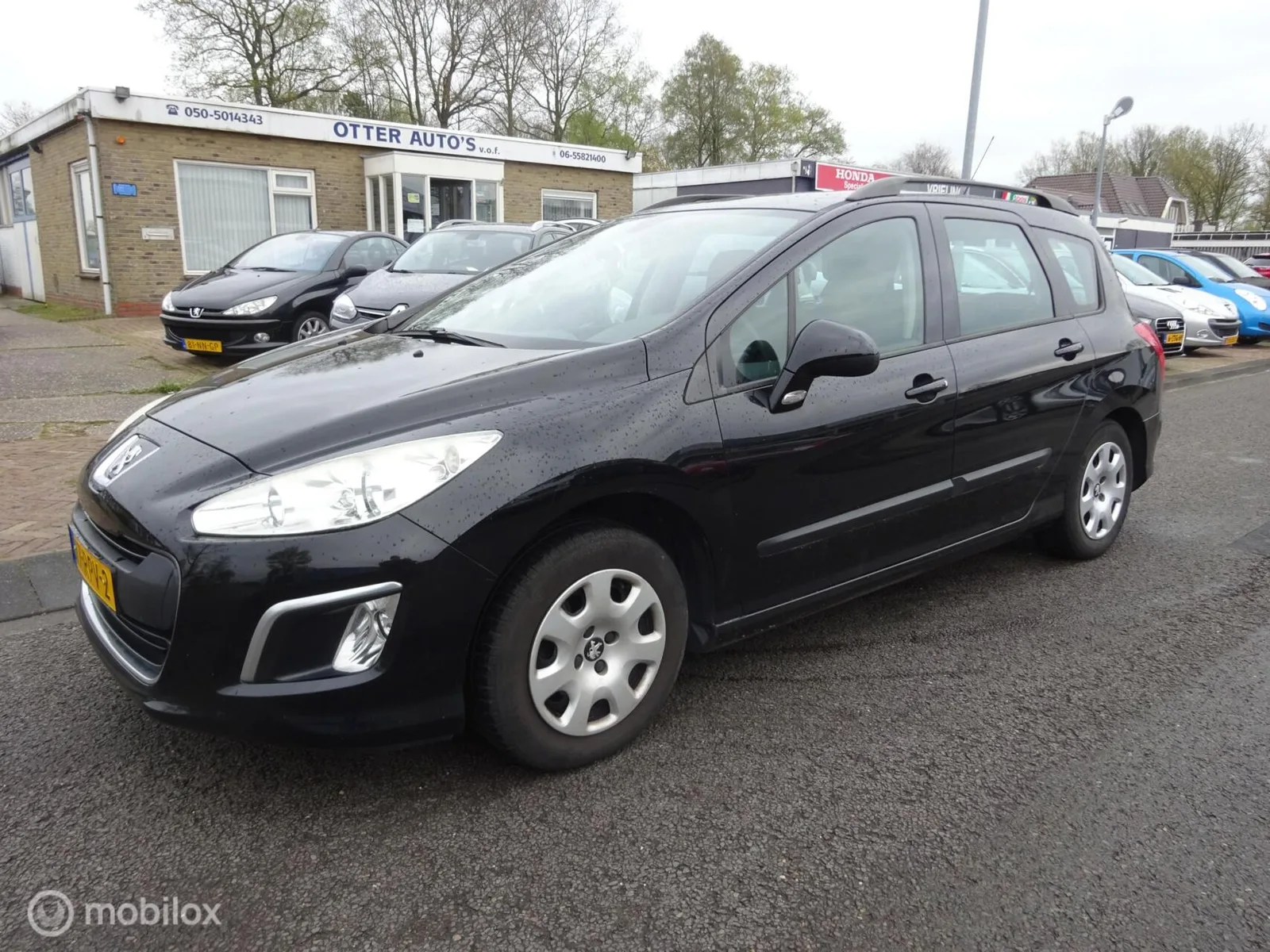 Peugeot 308 (2011) — foto 1