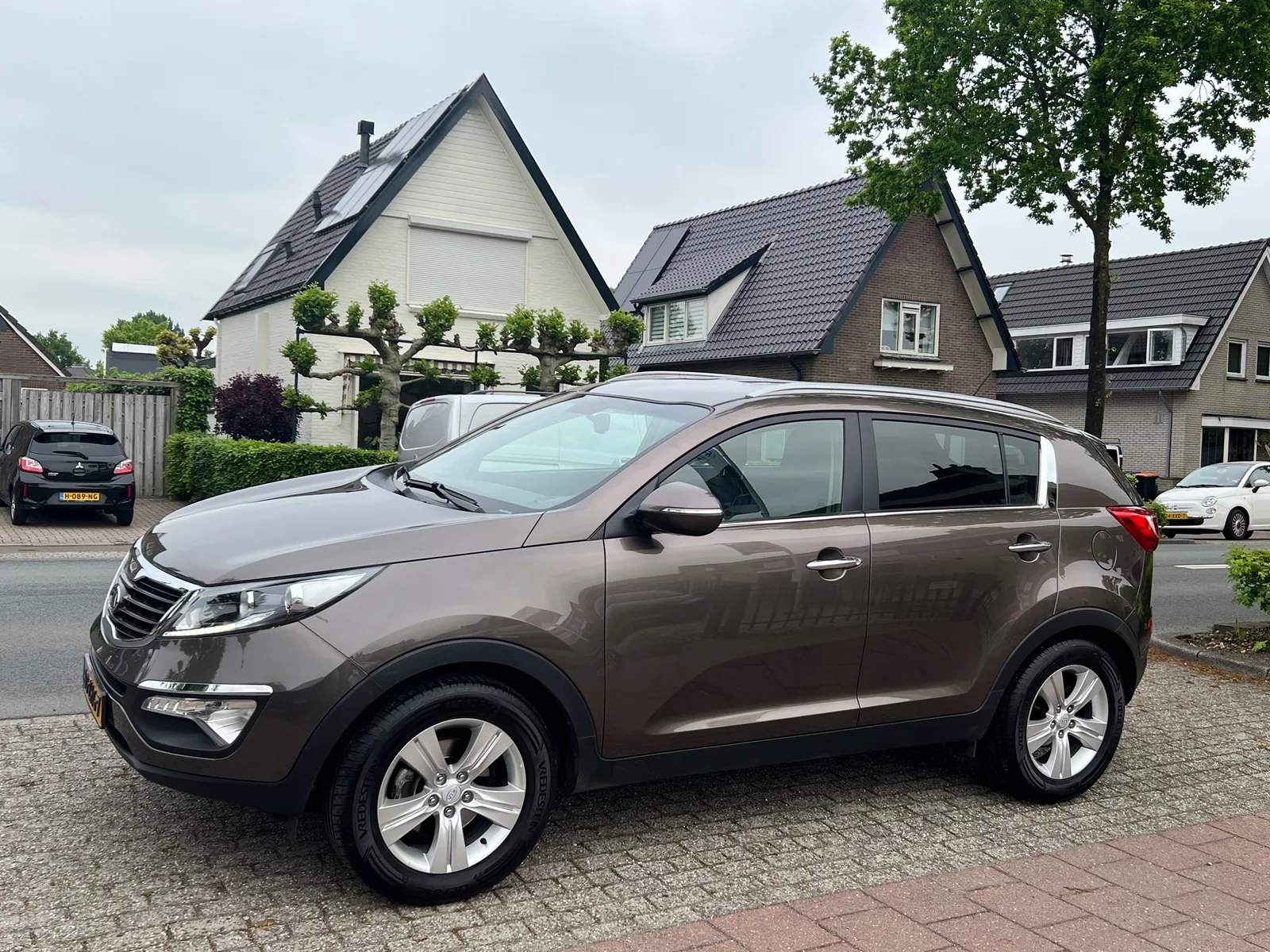 Kia Sportage (2012) — foto 1