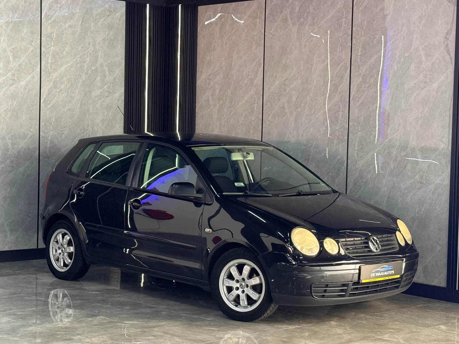 Volkswagen Polo (2004) — foto 1