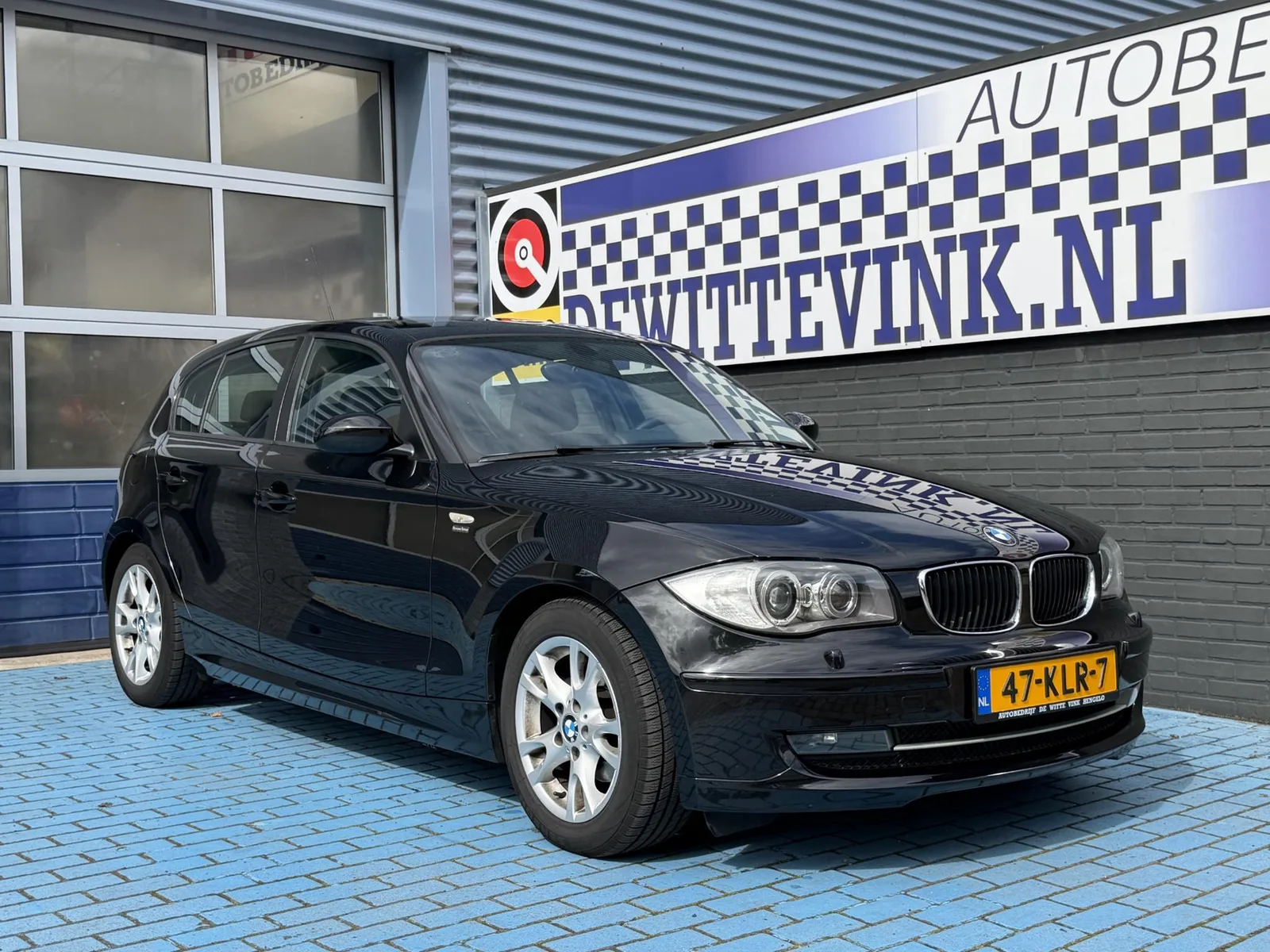 BMW 1-Serie (2009) — foto 1
