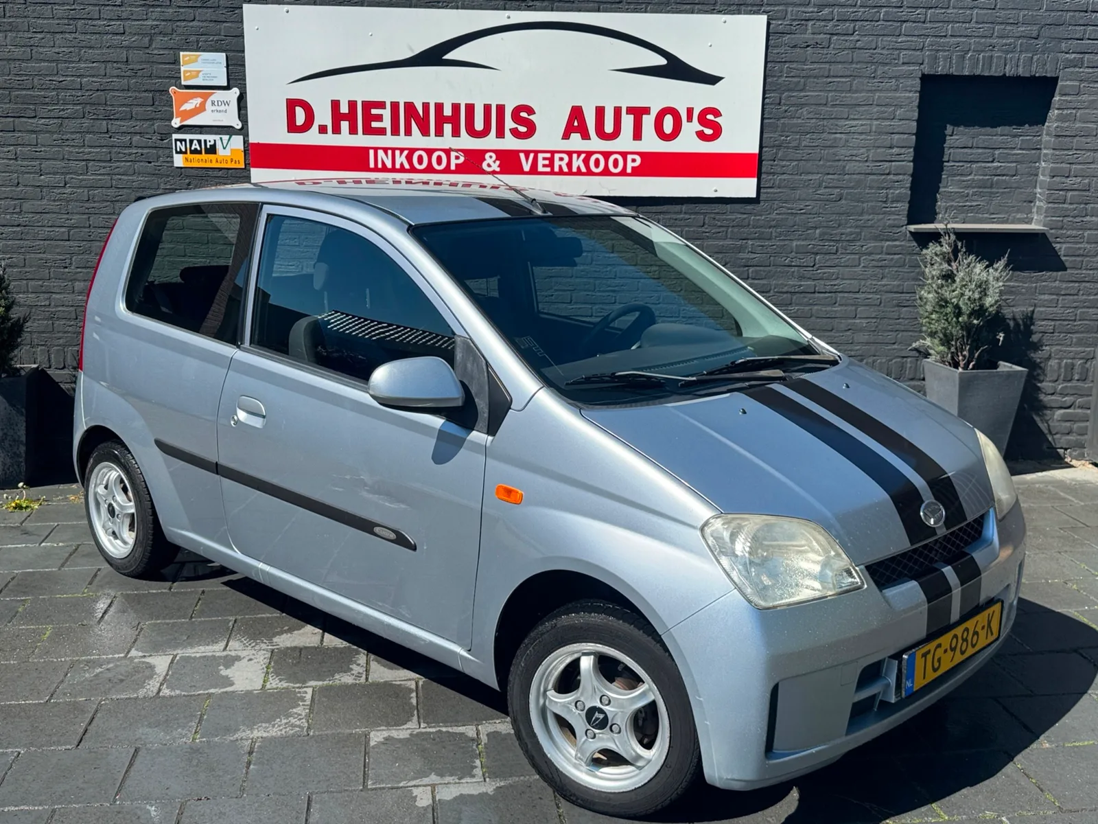 Daihatsu Cuore (2005) — foto 1