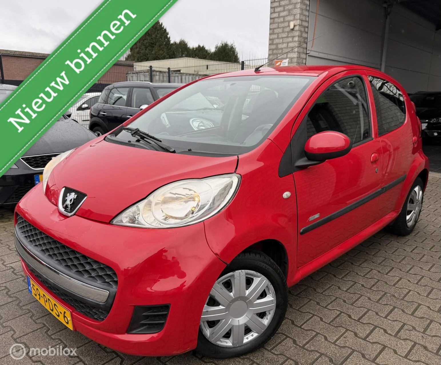 Peugeot 107 (2011) — foto 1