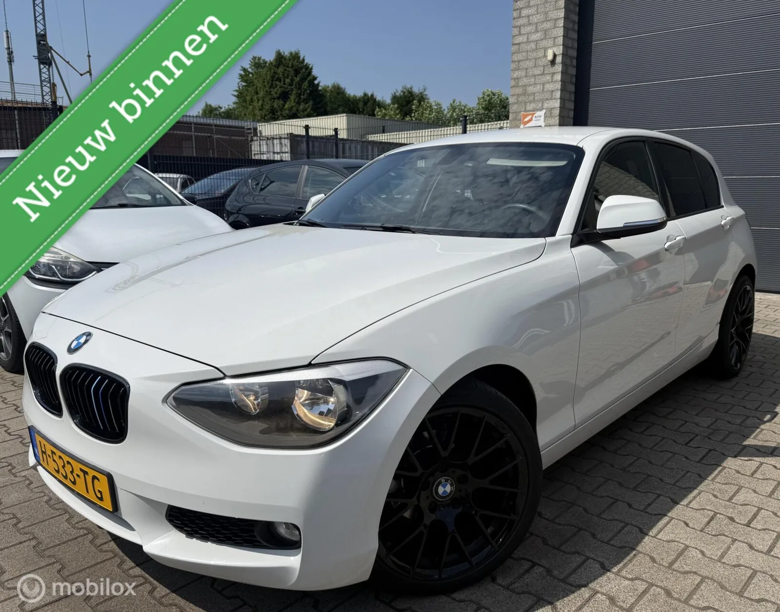 BMW 1-Serie (2011) — foto 1