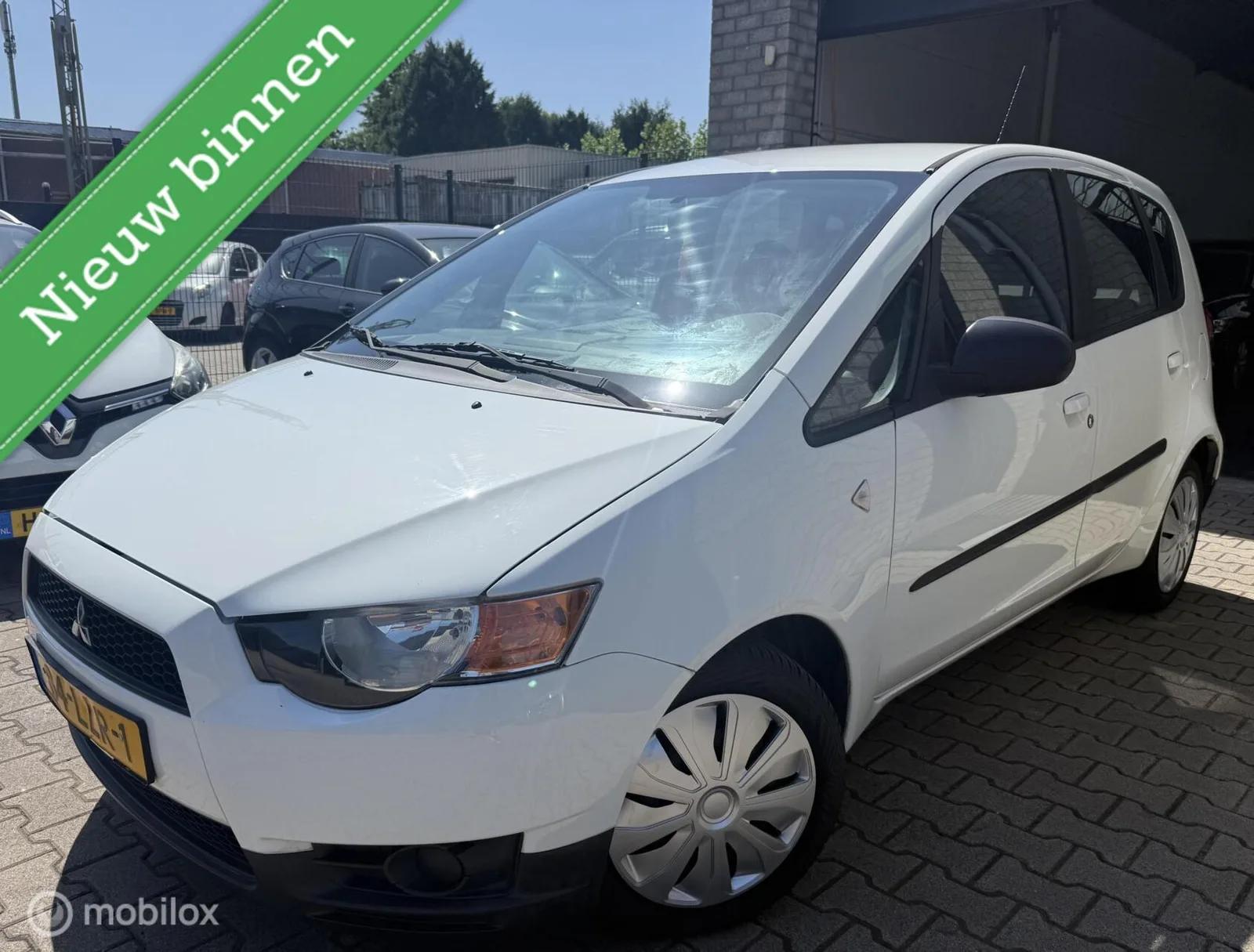 Mitsubishi Colt (2010) — foto 1
