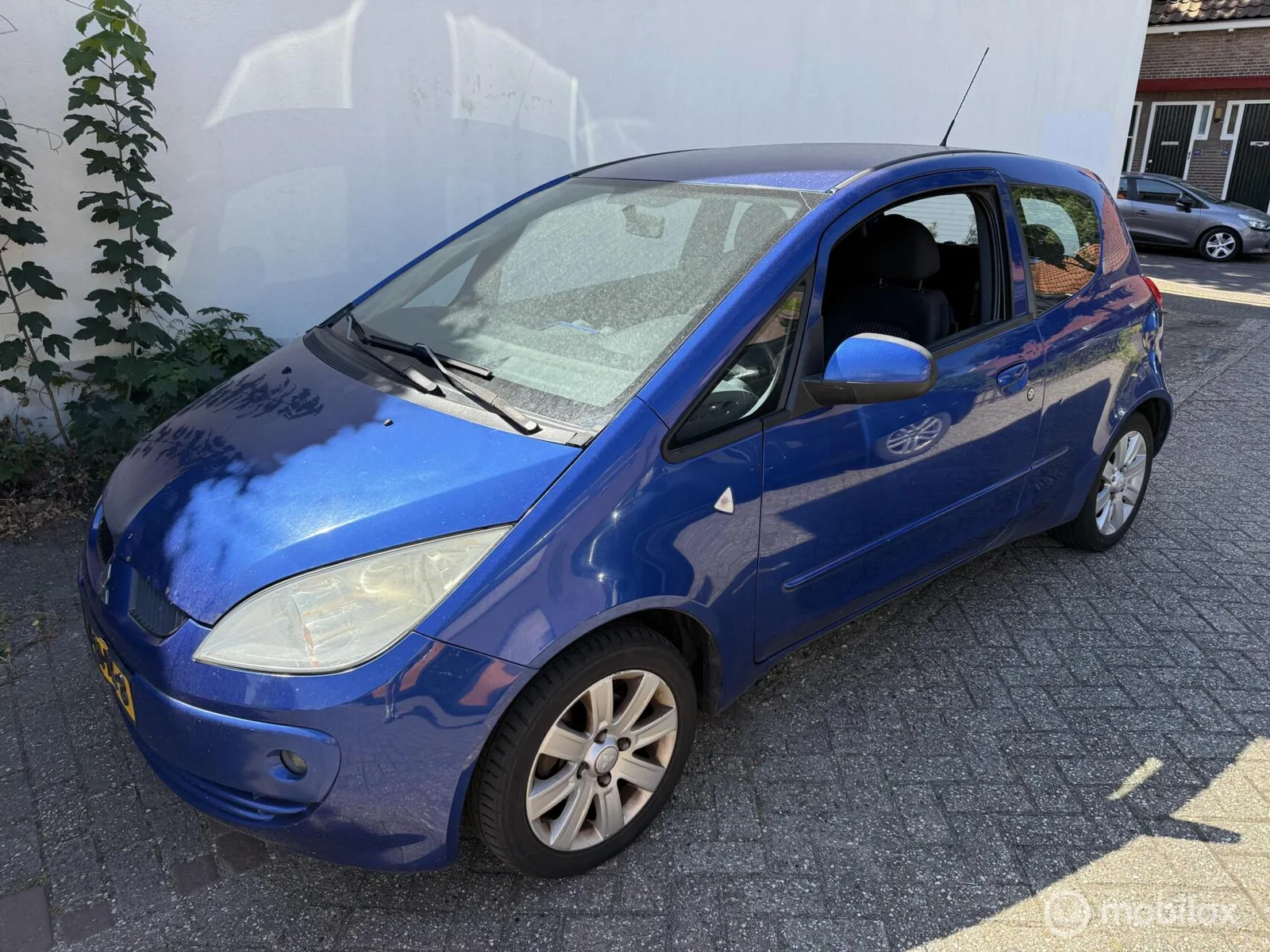 Mitsubishi Colt (2008) — foto 1