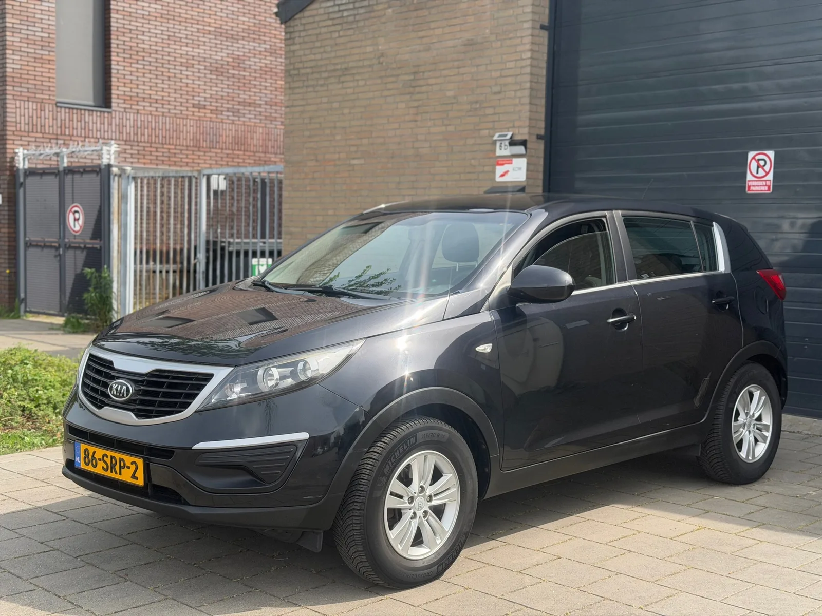 Kia Sportage (2012) — foto 1