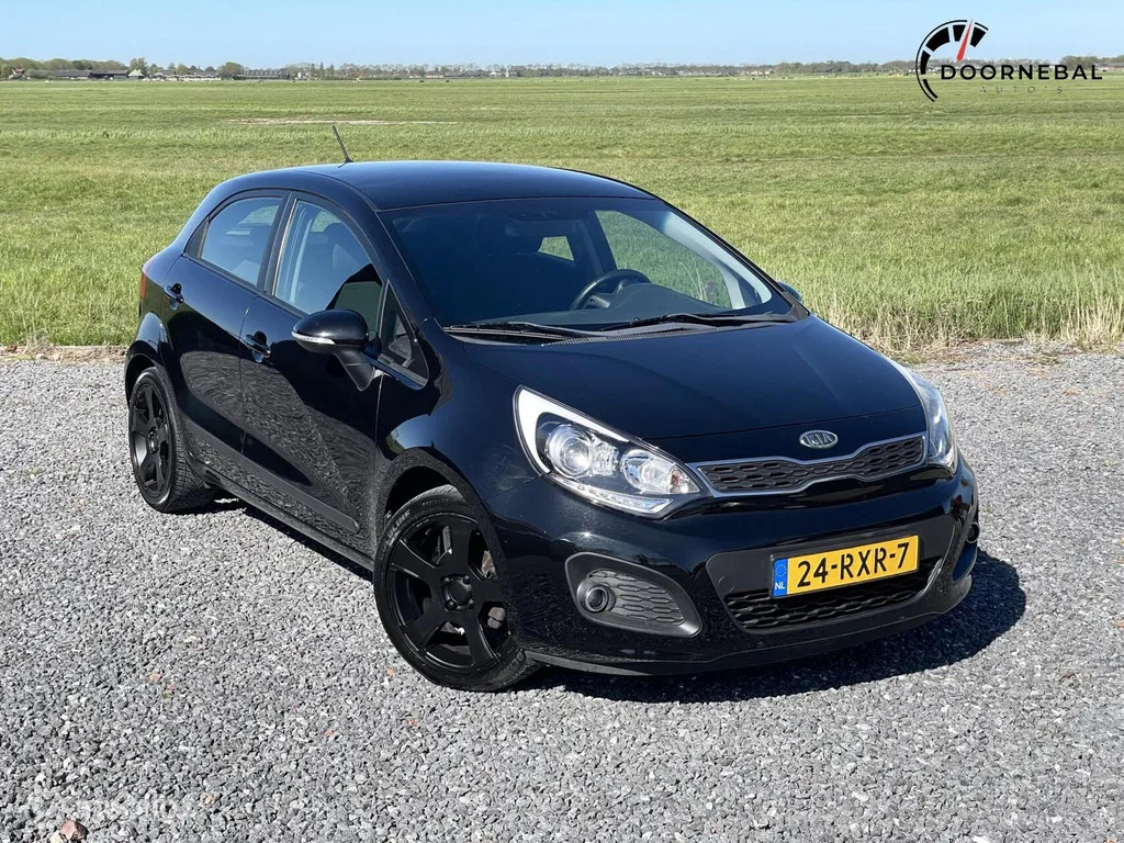 Kia Rio (2011) — foto 1