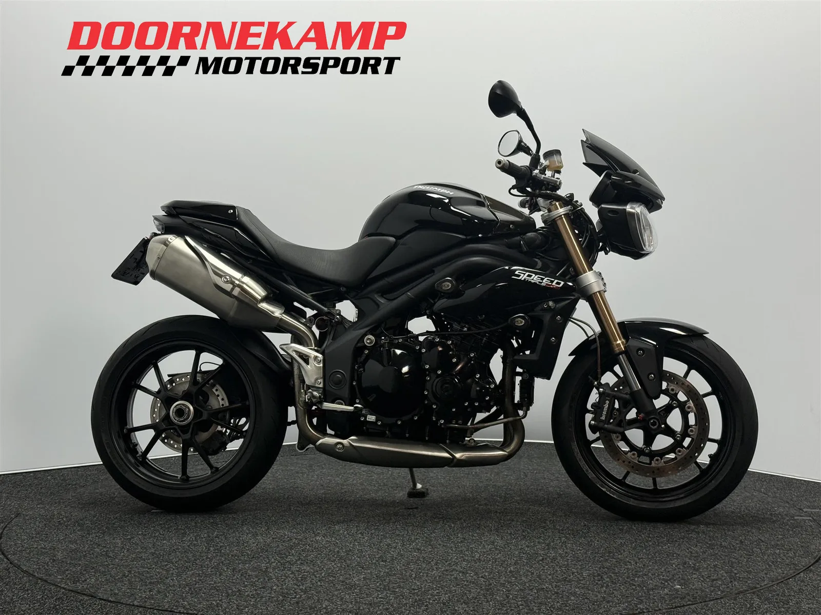 Triumph Speed Triple 1050 (2011) — foto 1