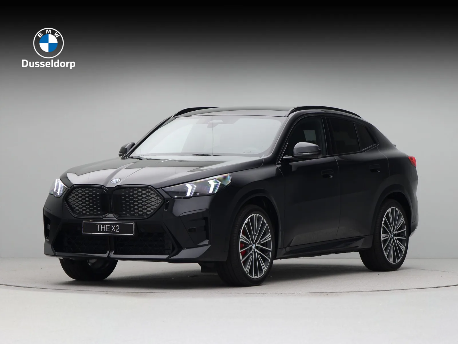 BMW iX2 (2026) — foto 1